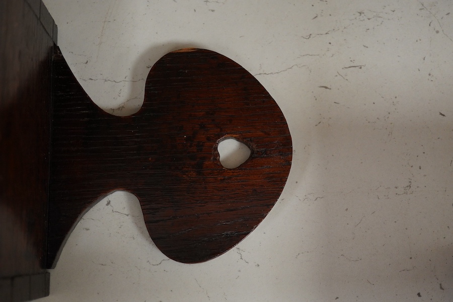 A George III mahogany cutlery tray, together with an oak hanging candle box, largest 48cm high. Condition - fair to good